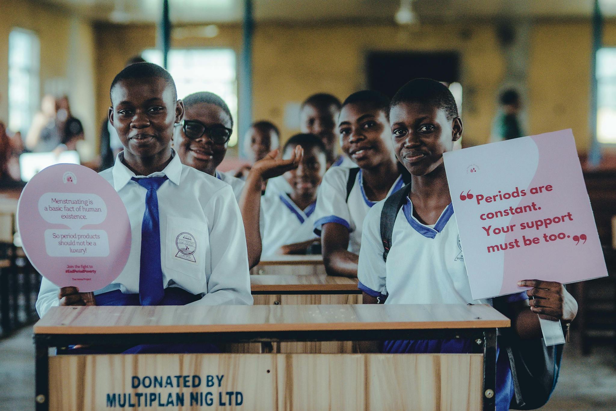 Schoolgirls advocate for period awareness and support in Africa.